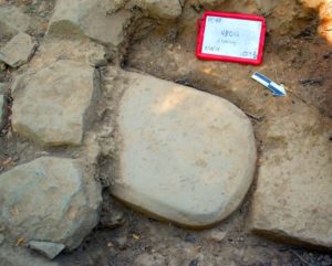 The 2,500-year-old Etruscan stele was discovered embedded in the foundations of a monumental temple at the Poggio Colla site in Italy. Image credit: Mugello Valley Project.